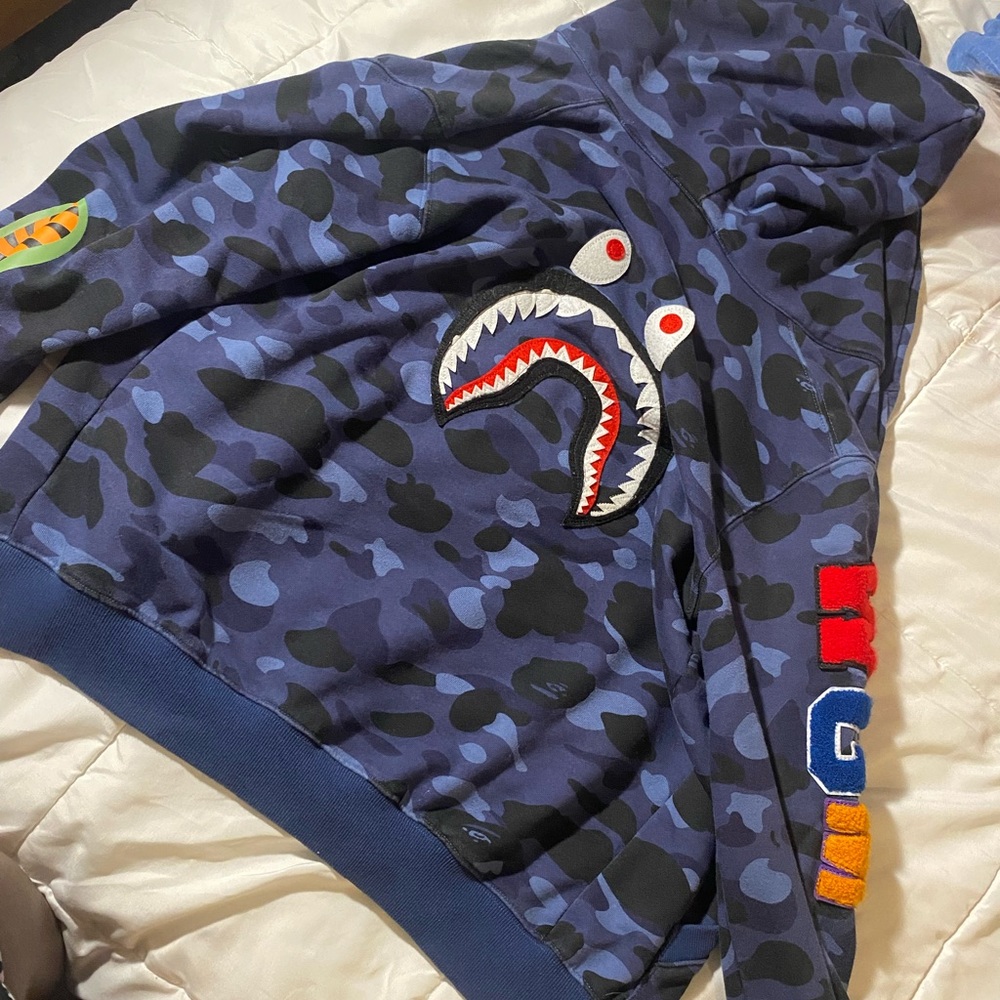 Blue Bape hoodie with face on back